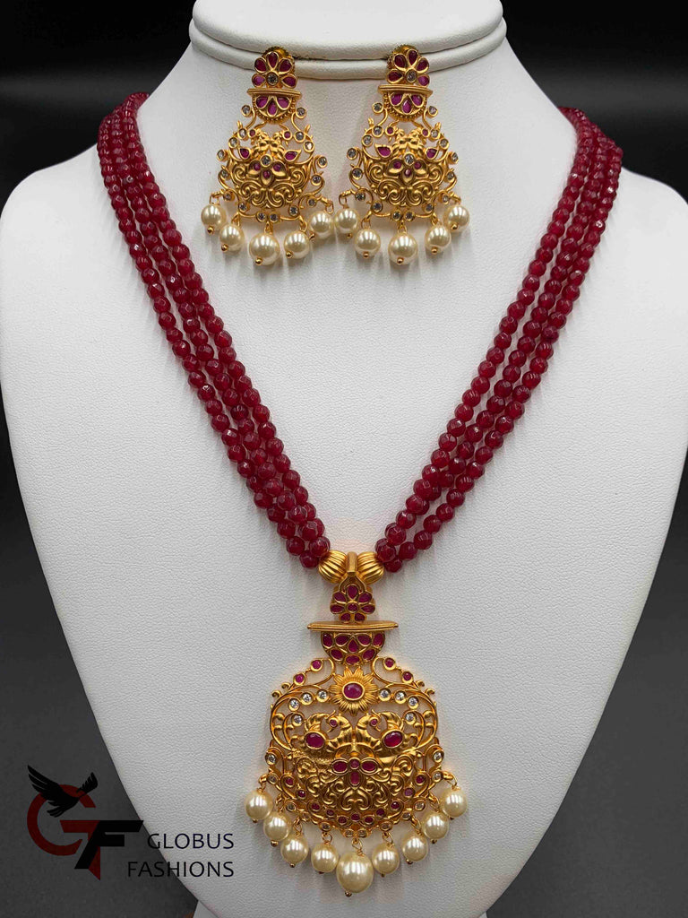 Ruby beads with matching antique pendant set