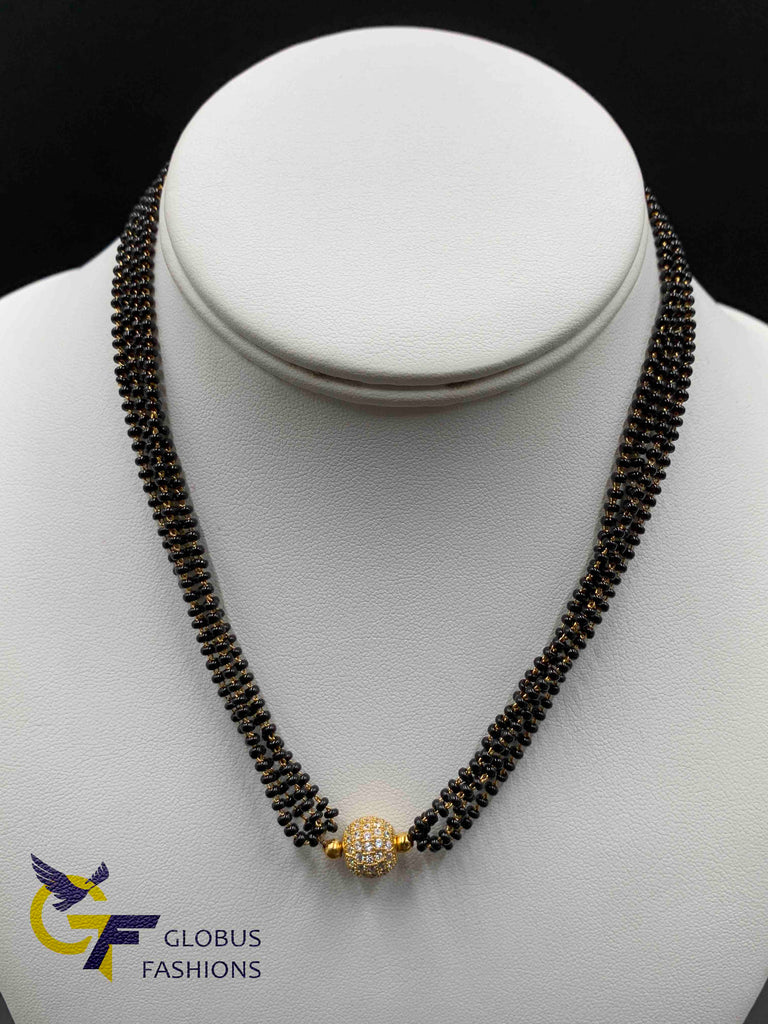 Bunch of black beads with cz stones ball pendant