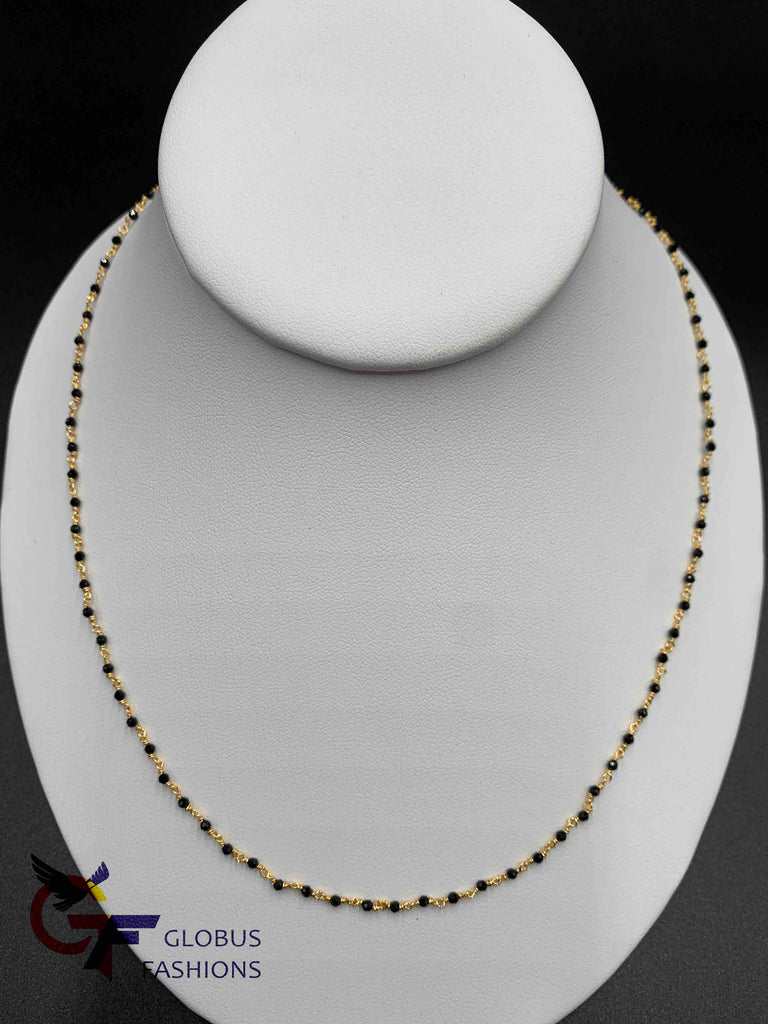 Single line black diamond beads with a gold twisted elegant chain