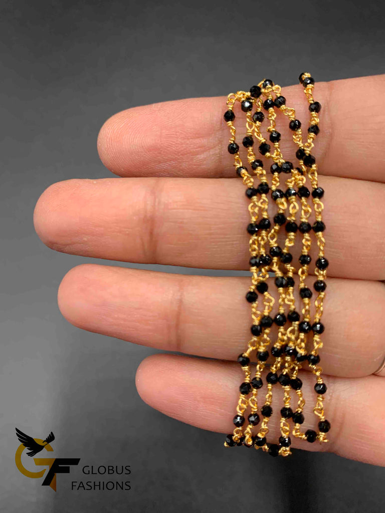 Single line black diamond beads with a gold twisted elegant chain