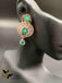 Elegant cz stones and emerald stones pendant set with matching emerald beads chain