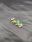 Leaf design emerald stones and cz Stones Saree pin/ brooch