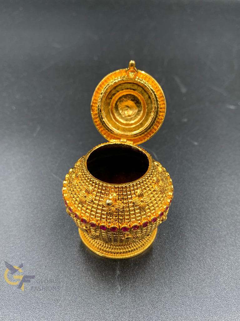 Plain gold with ruby stones kumkum box