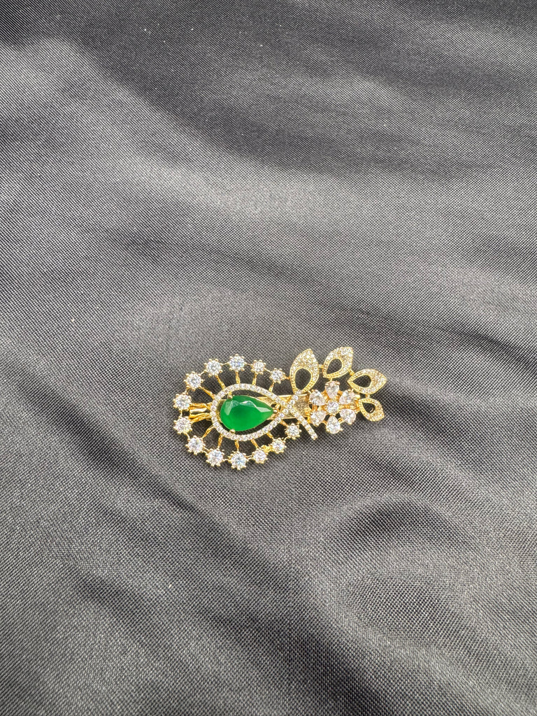 Flower design cz Stones and emerald stone Saree pin/ brooch