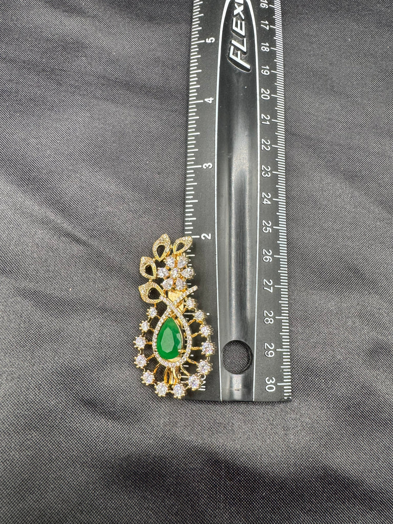 Flower design cz Stones and emerald stone Saree pin/ brooch