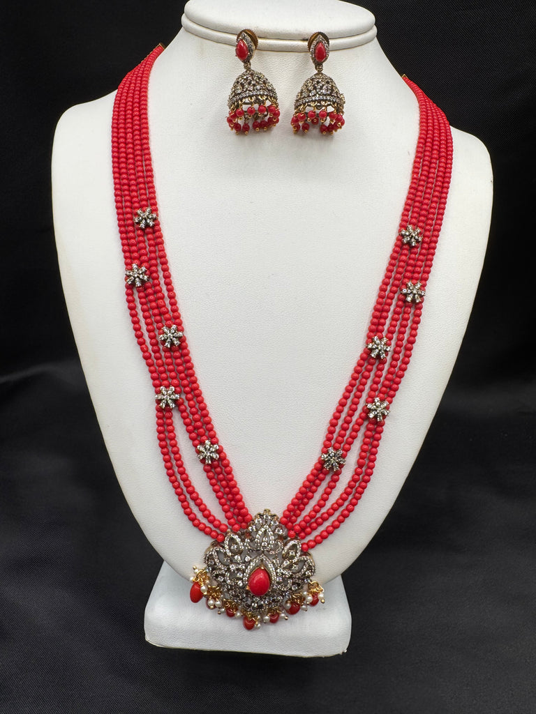 Elegant cz stones and Coral beads pendant set with matching jumka earrings