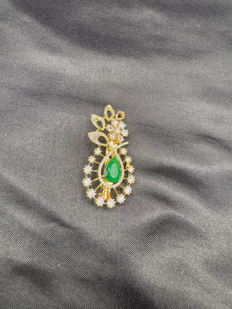 Flower design cz Stones and emerald stone Saree pin/ brooch