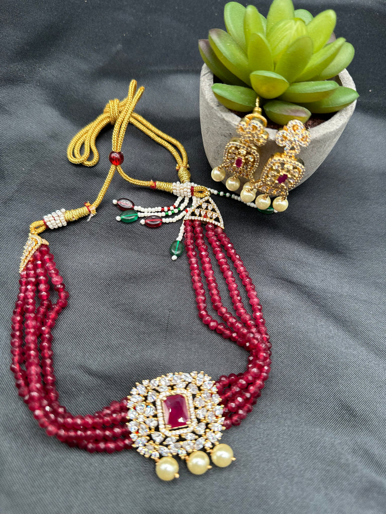 Ruby beads with CZ stones and pearls pendant with matching earrings