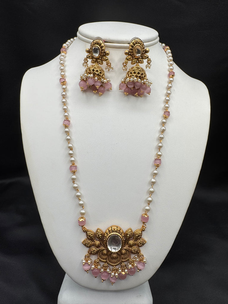 Pearls and pink beads chain with antique lotus pendant with matching jumka earrings