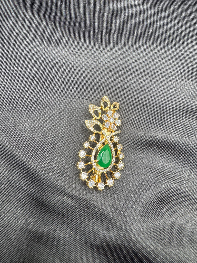 Flower design cz Stones and emerald stone Saree pin/ brooch