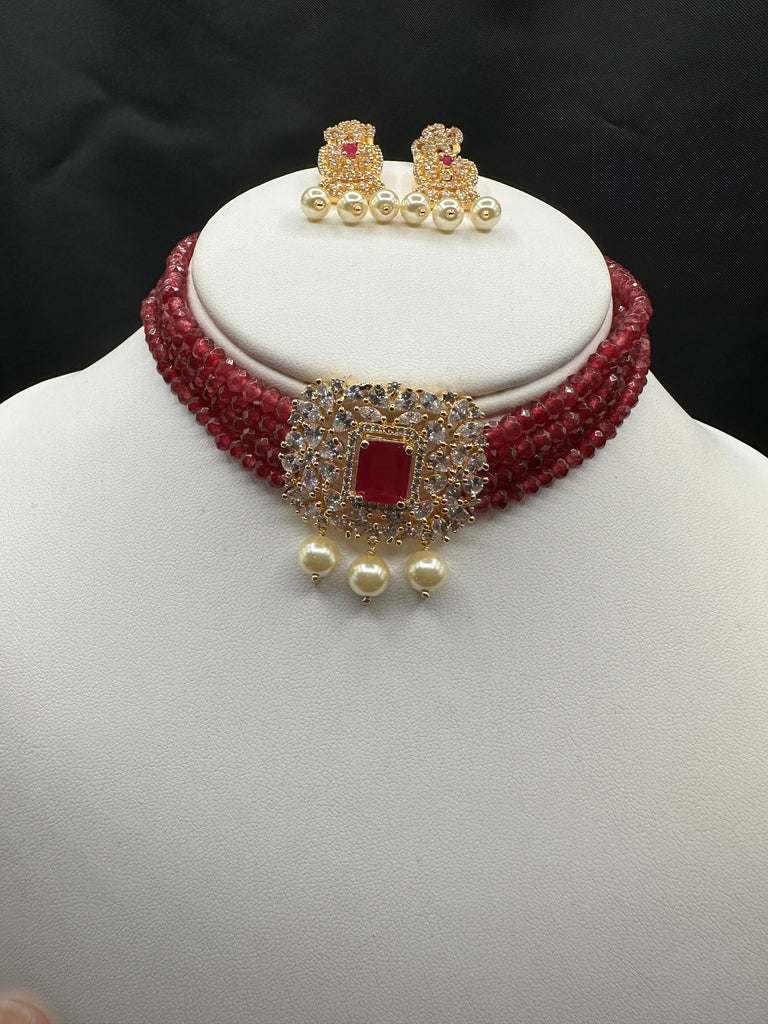 Ruby beads with CZ stones and pearls pendant with matching earrings