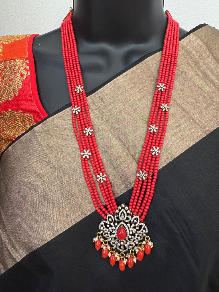 Elegant cz stones and Coral beads pendant set with matching jumka earrings