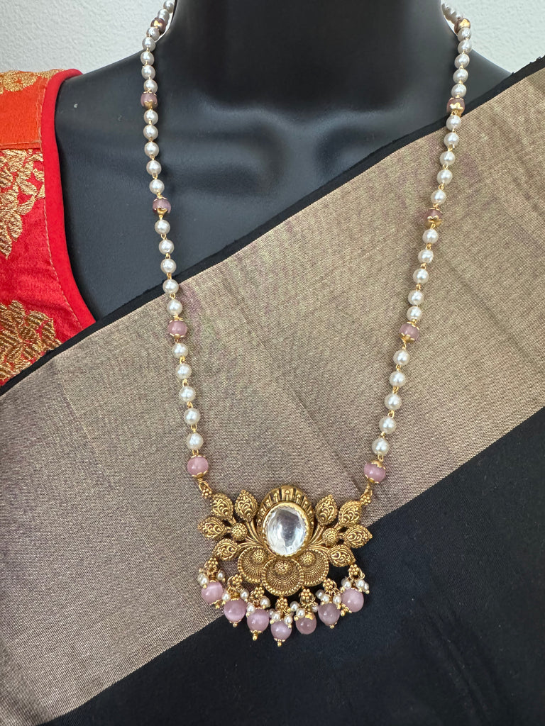 Pearls and pink beads chain with antique lotus pendant with matching jumka earrings