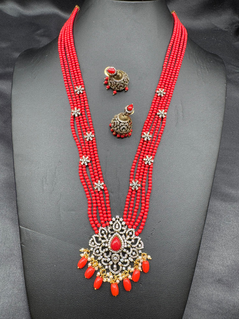 Elegant cz stones and Coral beads pendant set with matching jumka earrings