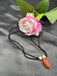 Coral flower carved bead pendant with black diamond beads chain