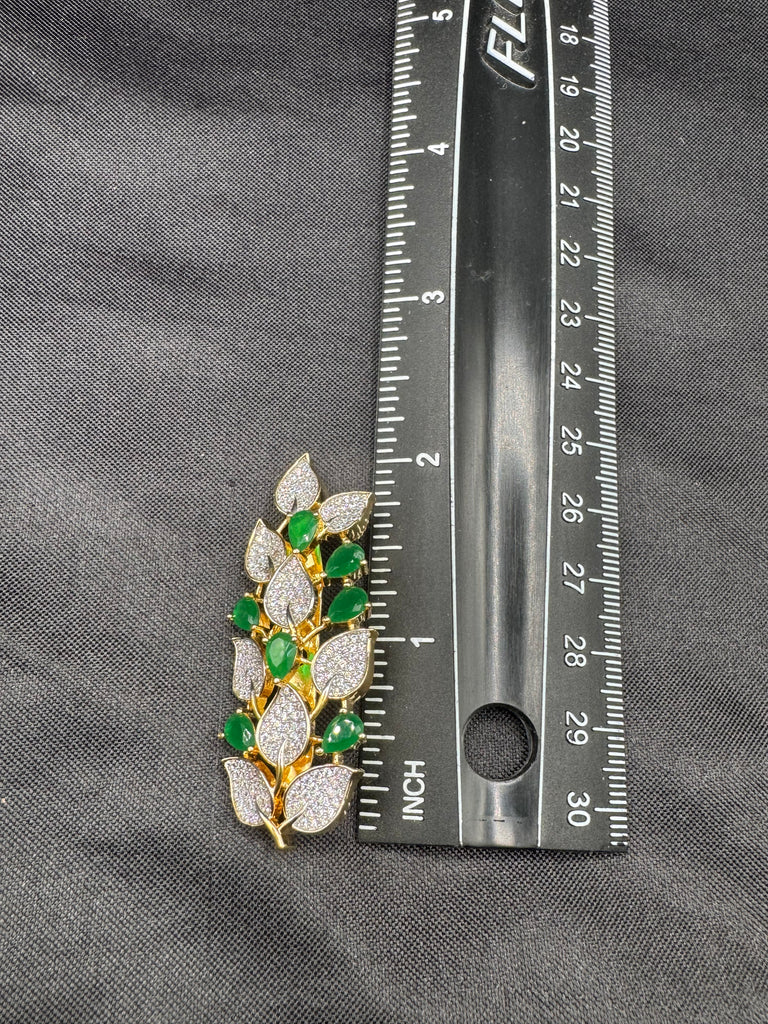 Leaf design emerald stones and cz Stones Saree pin/ brooch