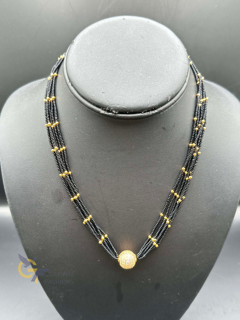 A bunch of soft black beads chain with CZ Stones ball pendant