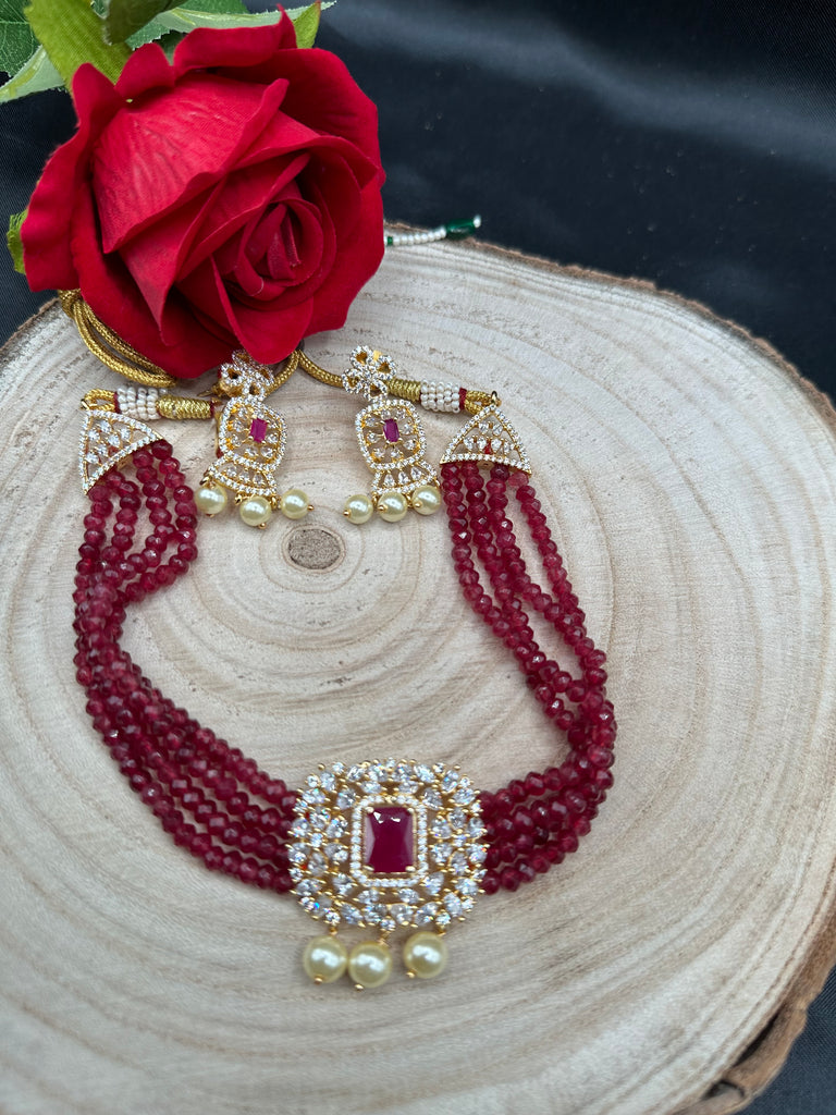 Ruby beads with CZ stones and pearls pendant with matching earrings