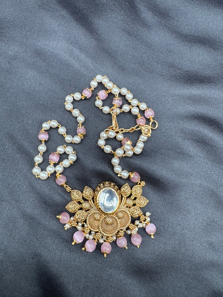 Pearls and pink beads chain with antique lotus pendant with matching jumka earrings