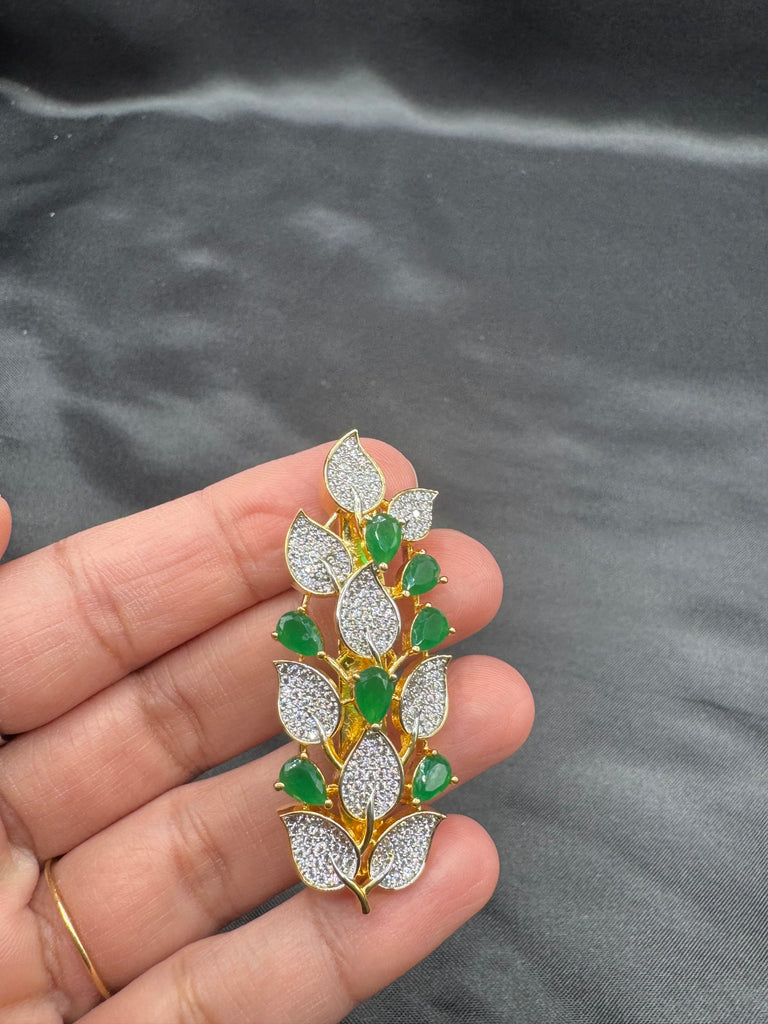 Leaf design emerald stones and cz Stones Saree pin/ brooch