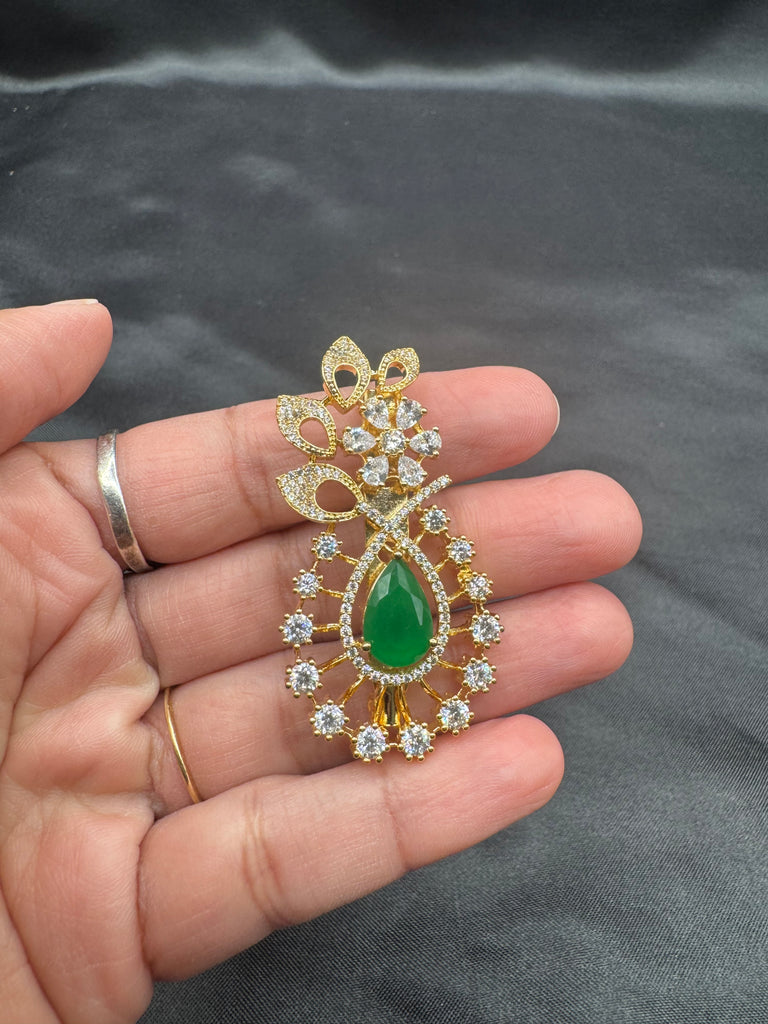 Flower design cz Stones and emerald stone Saree pin/ brooch