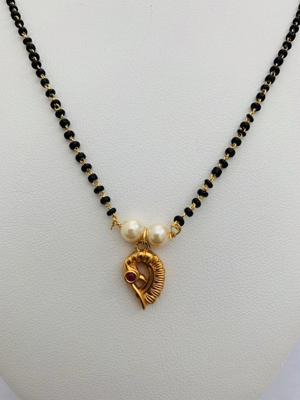Antique finish Peacock design pendant with a single line black beads chain - Globus Fashions