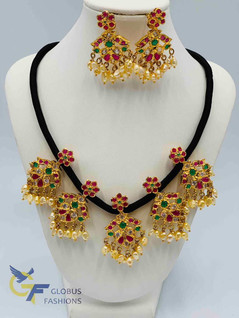 Beautiful multicolor stones and pearls with black thread