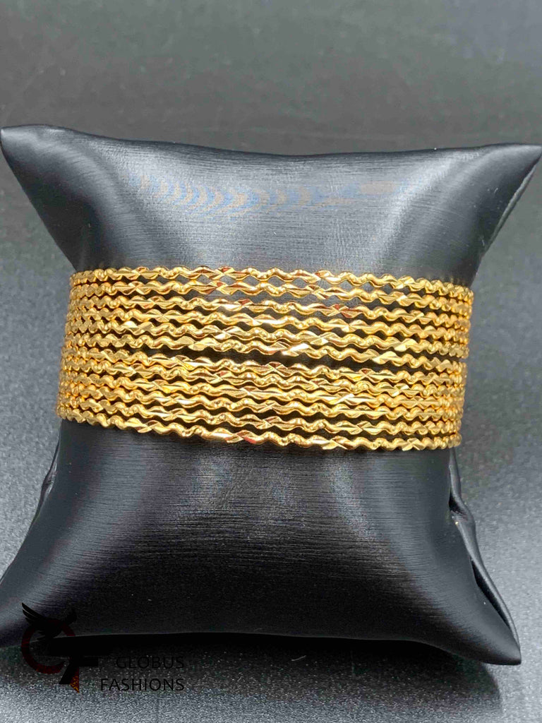 Plain gold zigzag design set of 24 bangles