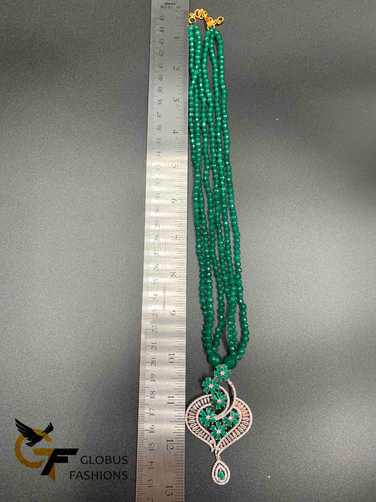 Elegant cz stones and emerald stones pendant set with matching emerald beads chain