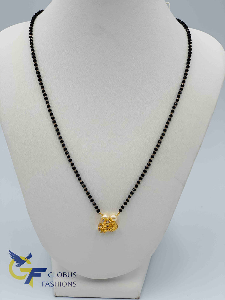 Traditional look Peacock design pendant with a single line black diamond beads chain