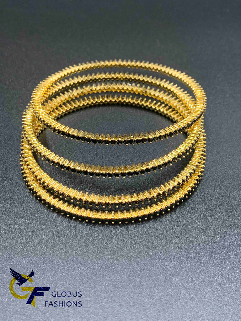 Small Black color stones set of four bangles
