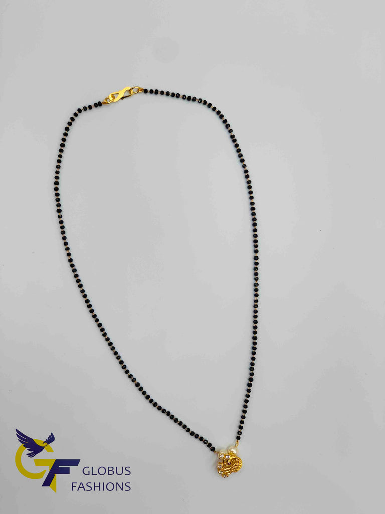 Traditional look Peacock design pendant with a single line black diamond beads chain