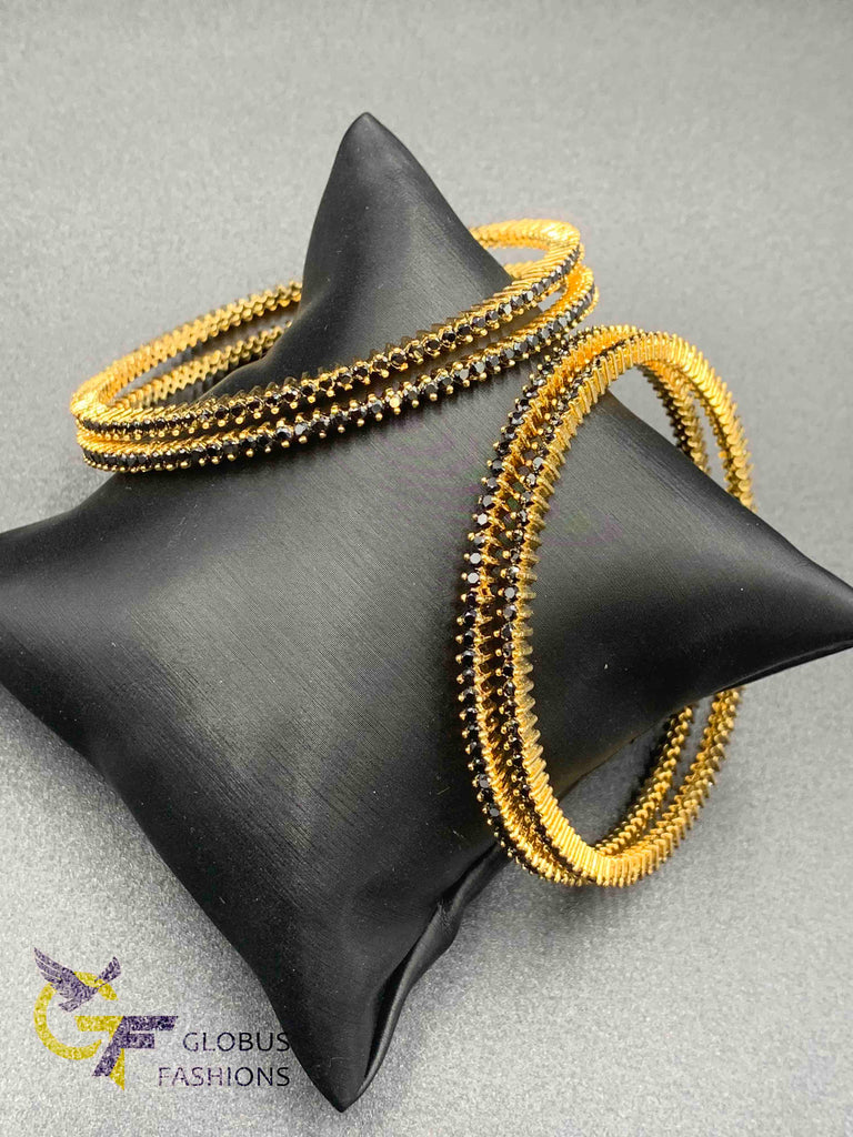 Small Black color stones set of four bangles