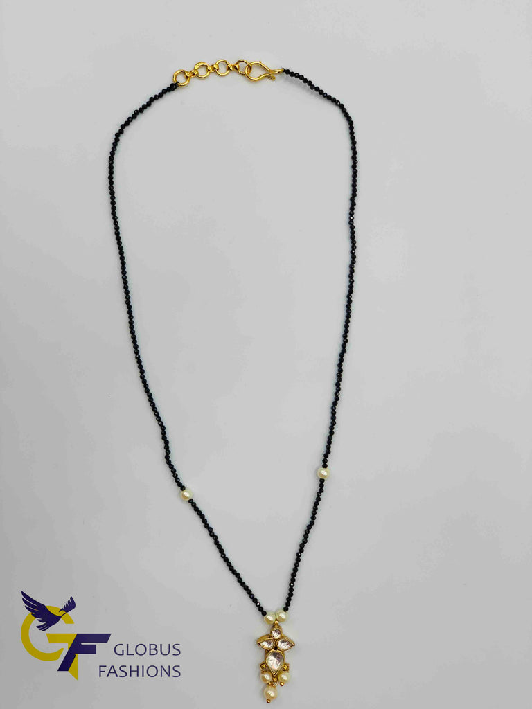 Single line black beads chain with kundan stones pendant