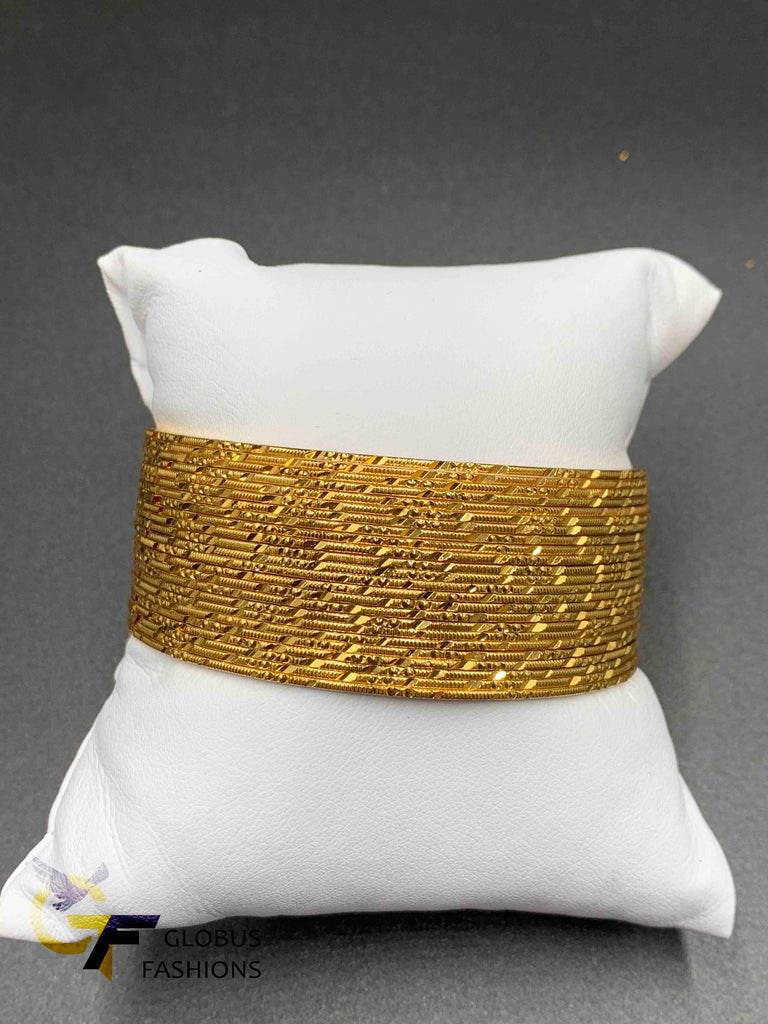 Set of 24 gold self-designed gold bangles