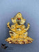 Flower design base with gold Ganesha idol