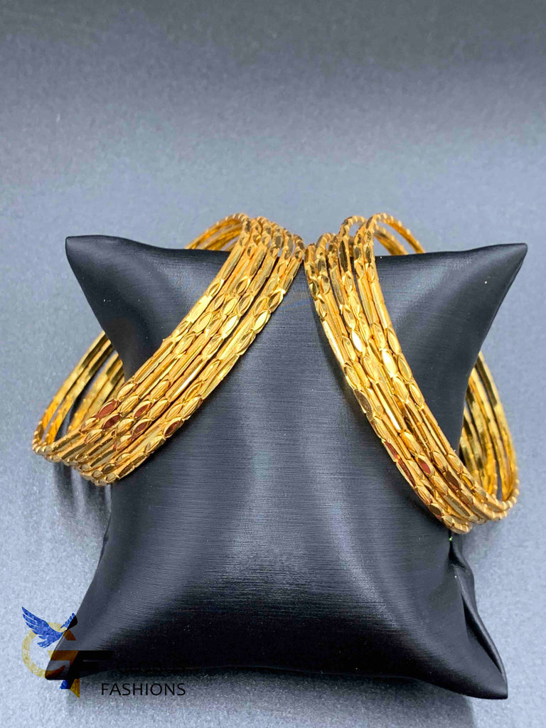 Designed gold set of 12 bangles