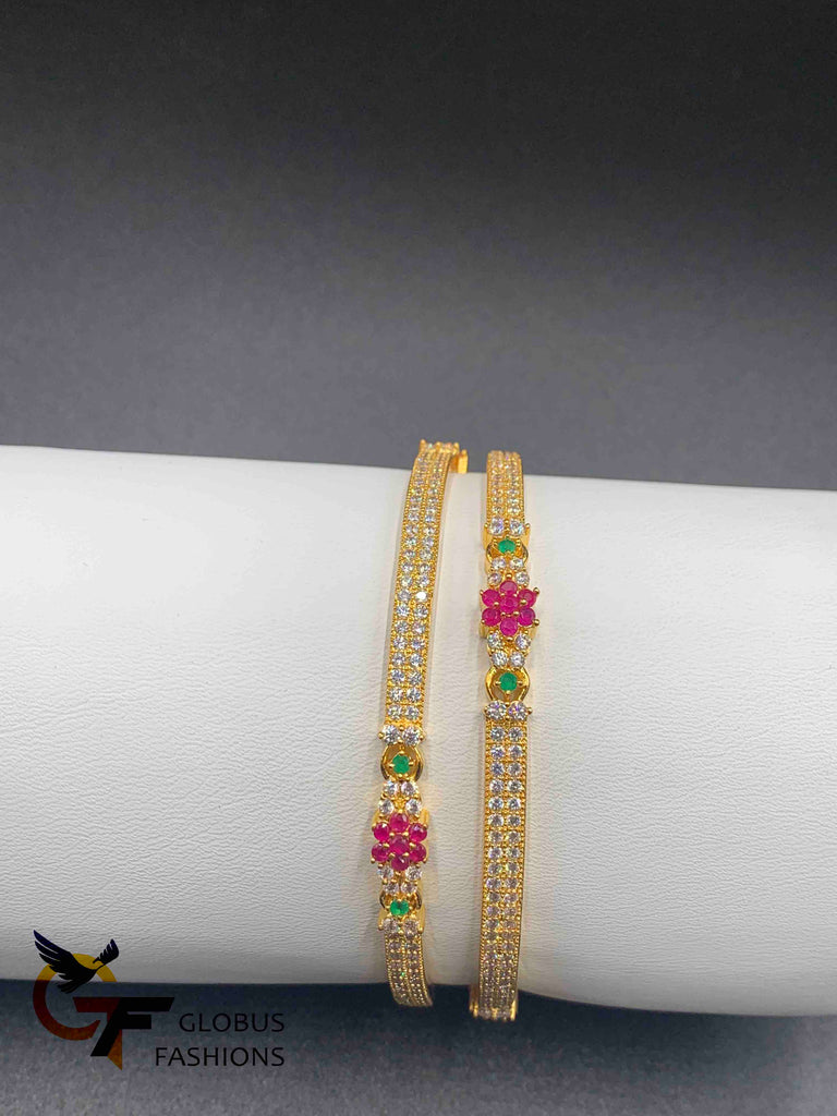 The multicolor stone flower design with cz stones set of two bangles