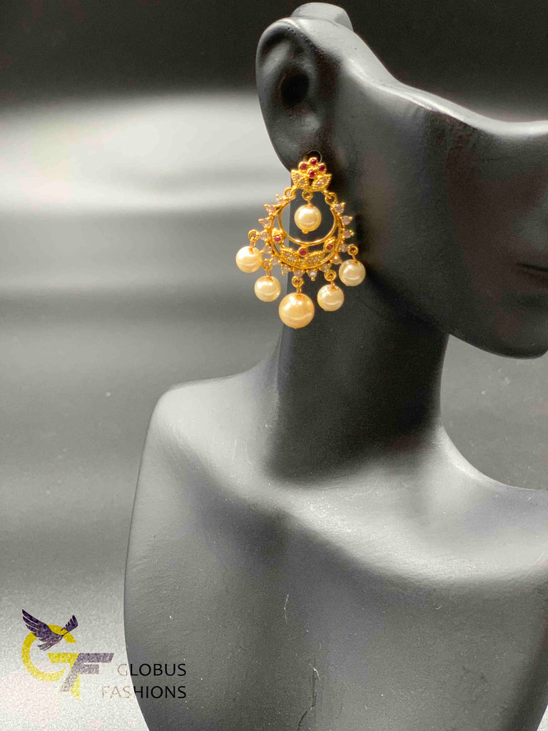 Simple flower design ruby and cz stones with pearls chandbali earrings