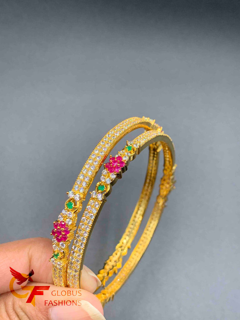 The multicolor stone flower design with cz stones set of two bangles