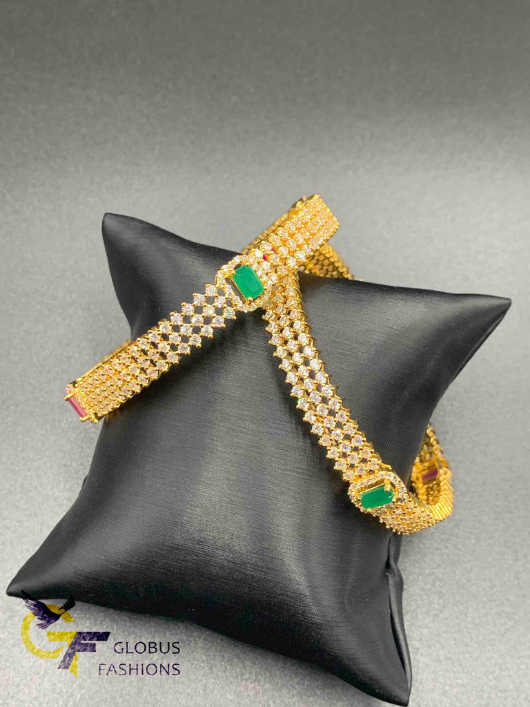 Cz stones and square-shaped ruby and emerald bangles