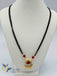Traditional kundan and ruby stones with pearls pendant with black diamond beads chain