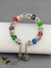 CZ Stones and multicolor Stones silver bracelet with hanging Jumkas